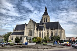 Church and the statue of horse in the centre of Vilvoorde - city near Brussels, Belgium